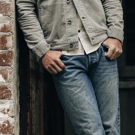 fit model with his hands in his pockets of The Democratic Jean in Sawyer Wash Organic Selvage