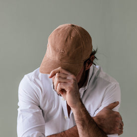 fit model posing in The Everyday Cap in Brick Pincord