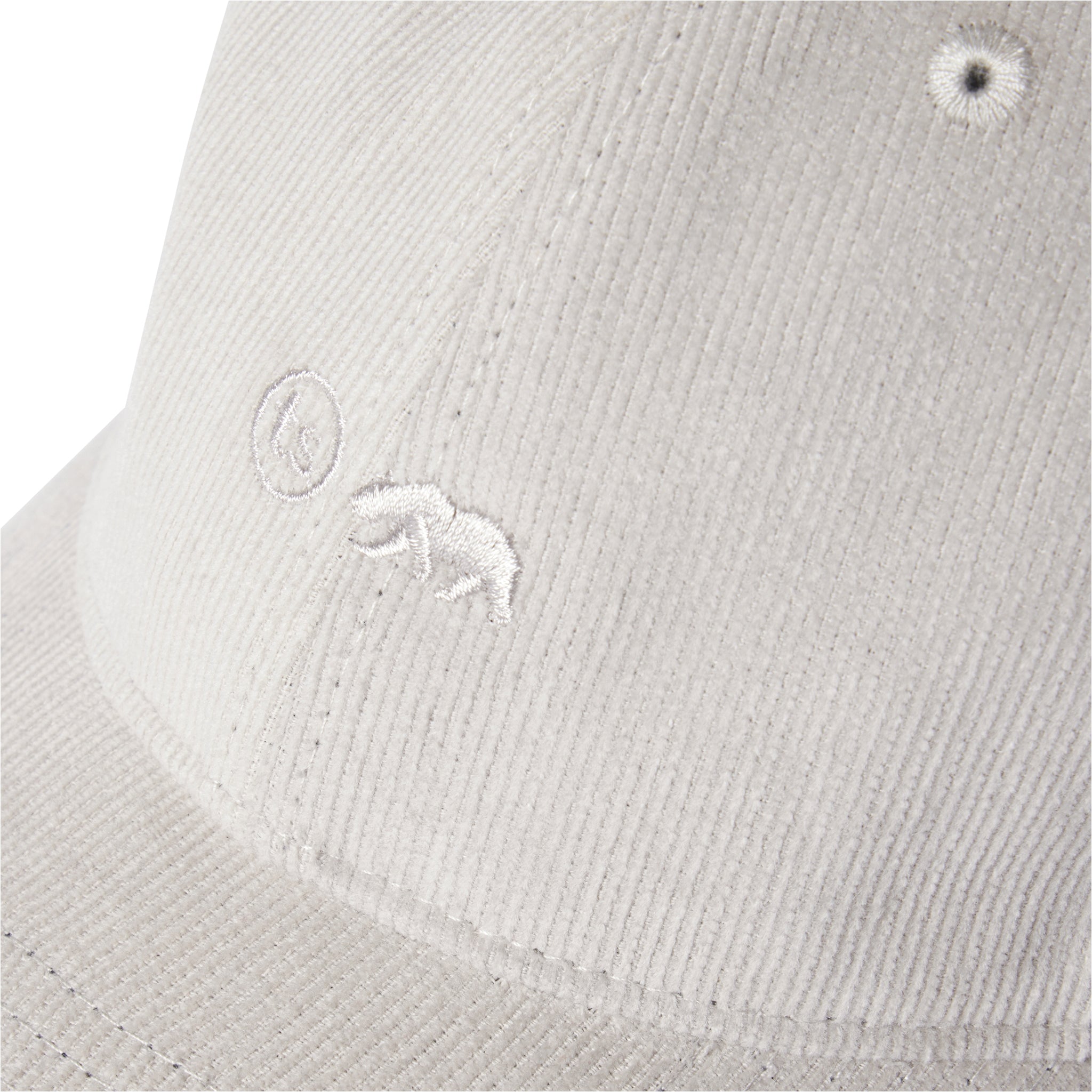 material shot of the logo on The Everyday Cap in Oyster Pincord, Accessories by Taylor Stitch