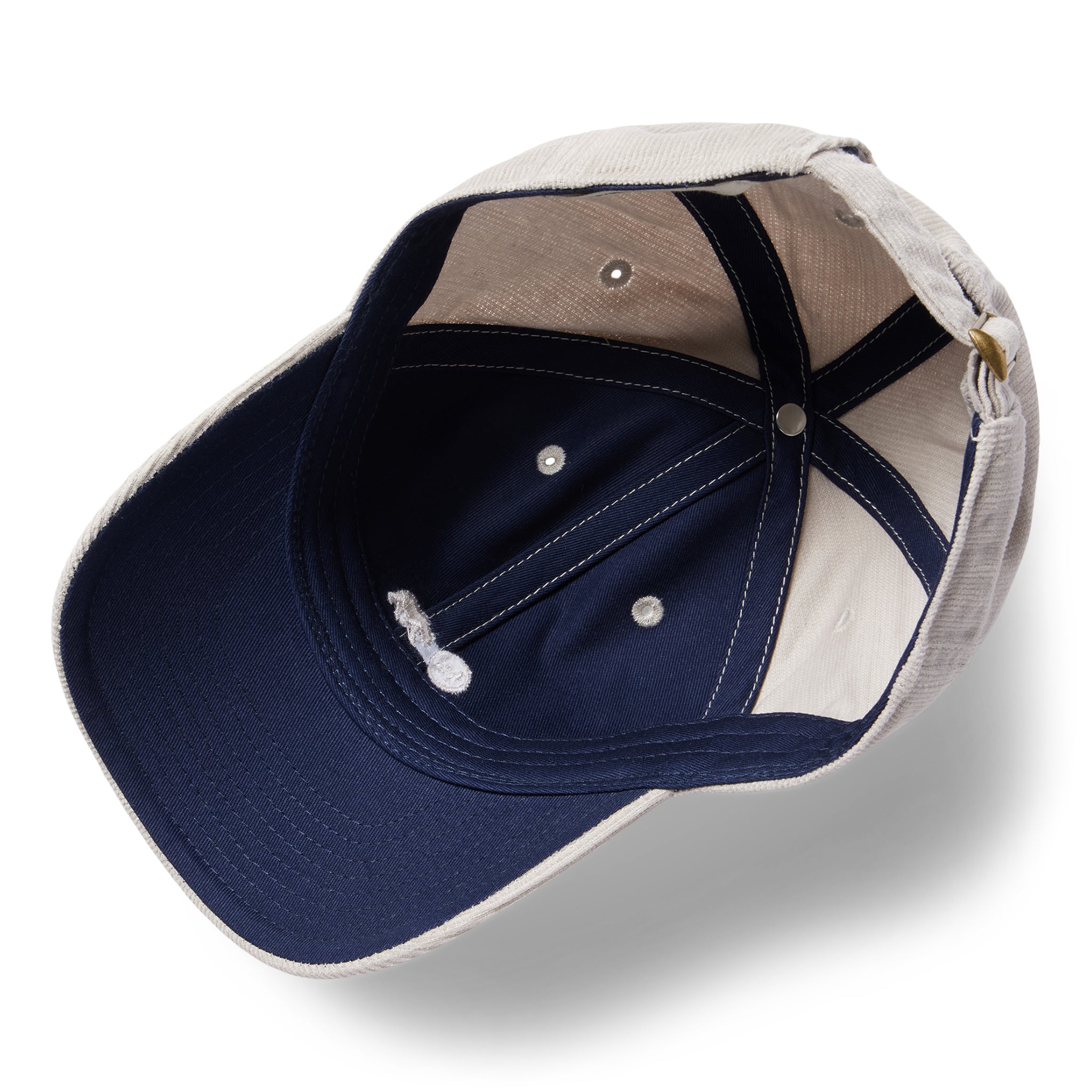 material shot of the inner lining of The Everyday Cap in Oyster Pincord, Accessories by Taylor Stitch