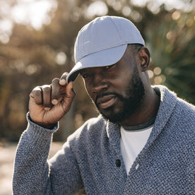 fit model posing in The Everyday Cap in Washed Blue Twill