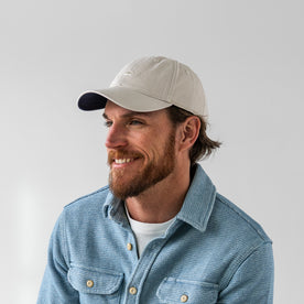 fit model posing in The Everyday Cap in Washed Stone Twill