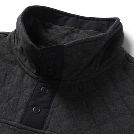 material shot of the stand collar on The Fall Line Pullover in Coal Heather