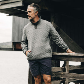 fit model wearing The Fall Line Pullover in Cypress Heather