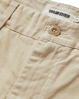 material shot of the button fly on The Foundation Short in Organic Dune, Bottoms by Taylor Stitch