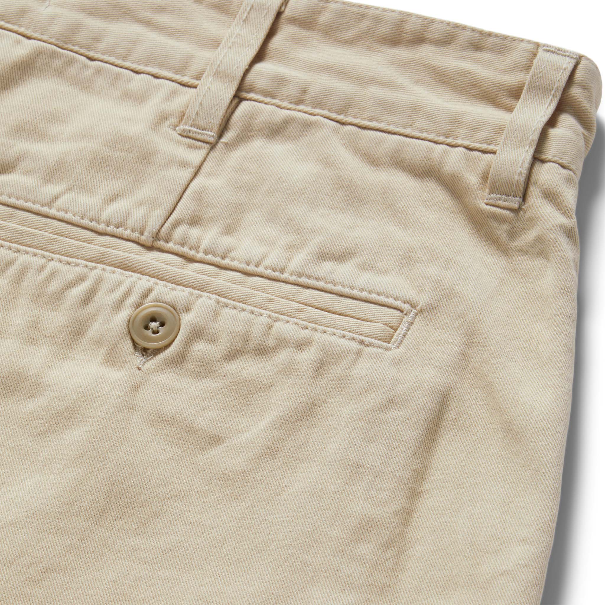 material shot of the rear pocket on The Foundation Short in Organic Dune, Bottoms by Taylor Stitch