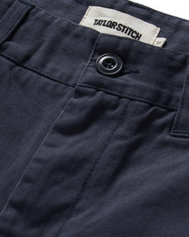 material shot of the button fly on The Foundation Short in Organic Marine, Bottoms by Taylor Stitch