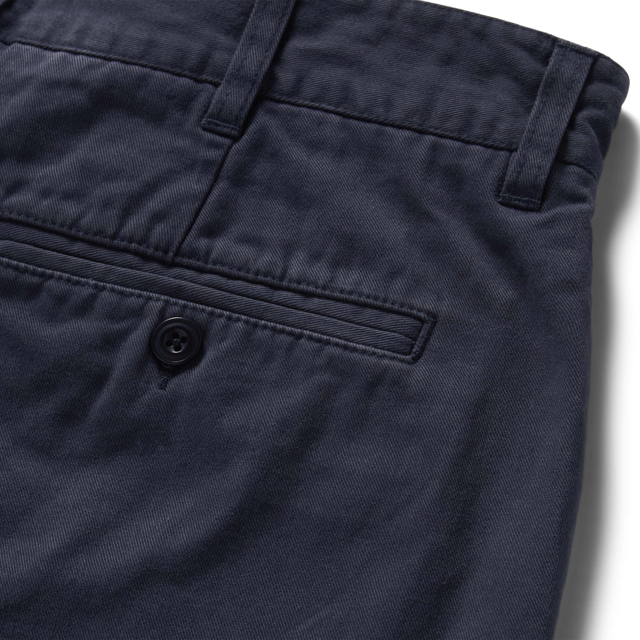 material shot of the rear pocket on The Foundation Short in Organic Marine, Bottoms by Taylor Stitch