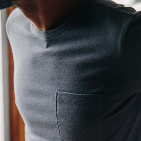 fit model showing chest pocket of The Heavy Bag Tee in Storm