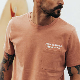 fit model showing the front of The Heavy Bag Tee in Dawn Patrol