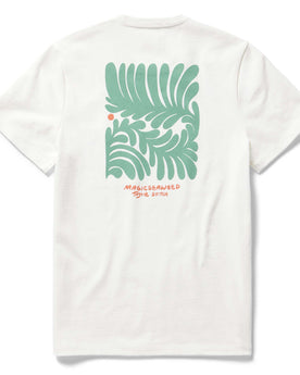 material shot of the back of The Heavy Bag Tee in Sea Lettuce with original art by Ty Williams, Knits by Taylor Stitch