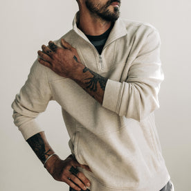 fit model posing in The Horizon Pullover in Oat Heather