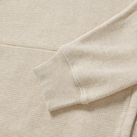 material shot of the sleeve on The Horizon Pullover in Oat Heather