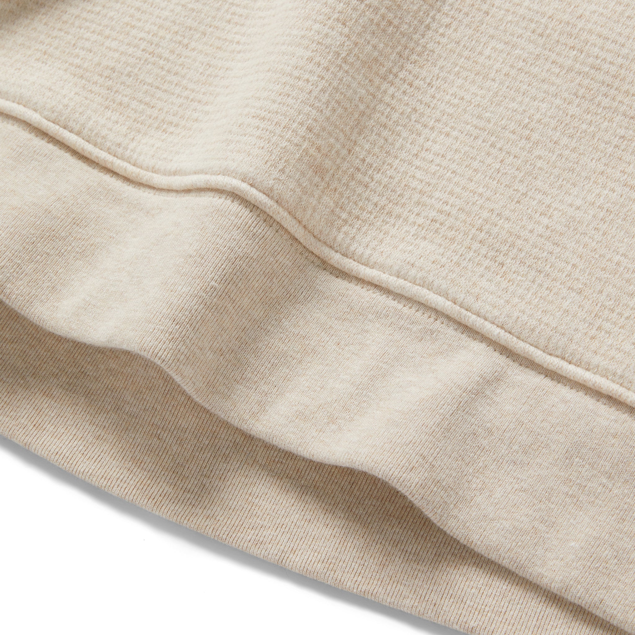 material shot of the hem on The Horizon Pullover in Oat Heather, Knits by Taylor Stitch