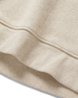 material shot of the hem on The Horizon Pullover in Oat Heather, Knits by Taylor Stitch