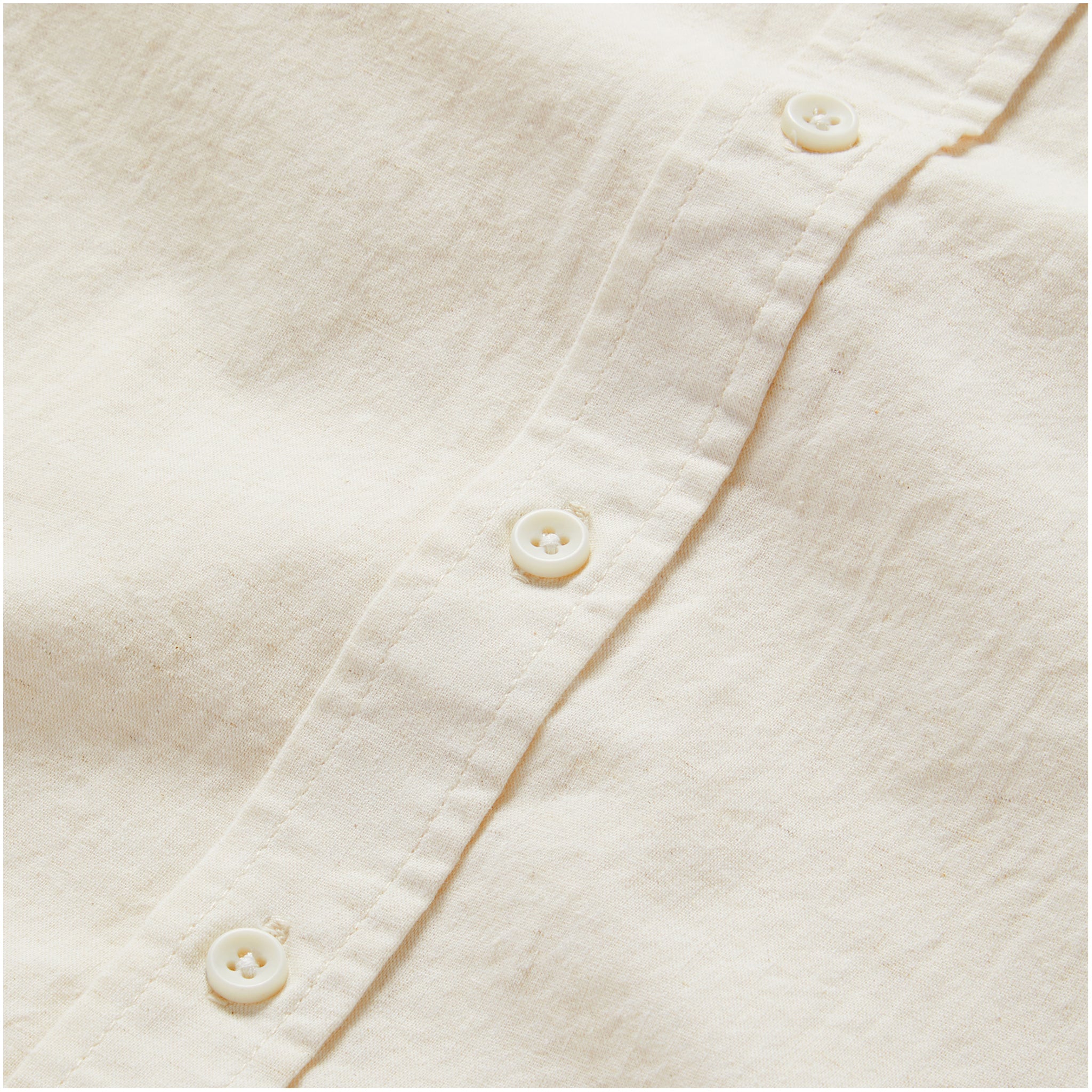material shot of the buttons on The Jack in Heathered Oat, Wovens by Taylor Stitch