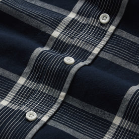 material shot of the buttons on The Jack in Midnight Plaid
