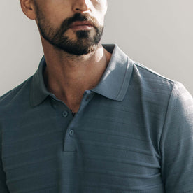 fit model showing the front of The Jacquard Polo in Storm
