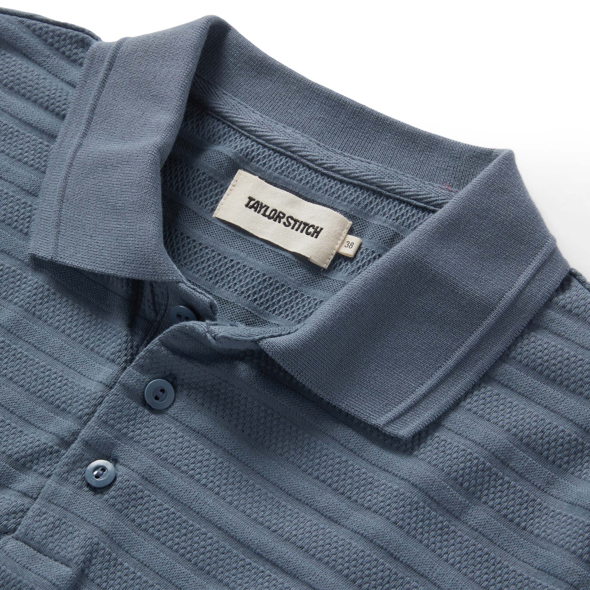 material shot of the collar on The Jacquard Polo in Storm, Knits by Taylor Stitch