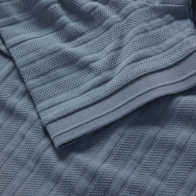 material shot of the sleeve on The Jacquard Polo in Storm