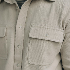 fit model showing the front flap pockets on The Ledge Shirt in Natural Twill