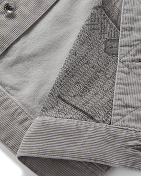 material shot of the map print lining on The Long Haul Jacket in Steeple Grey Cord, Outerwear by Taylor Stitch