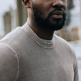 fit model showing off collar on The Moor Sweater in Steeple Grey