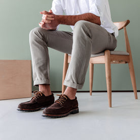 fit model sitting in The Morse Pant in Oyster Slub