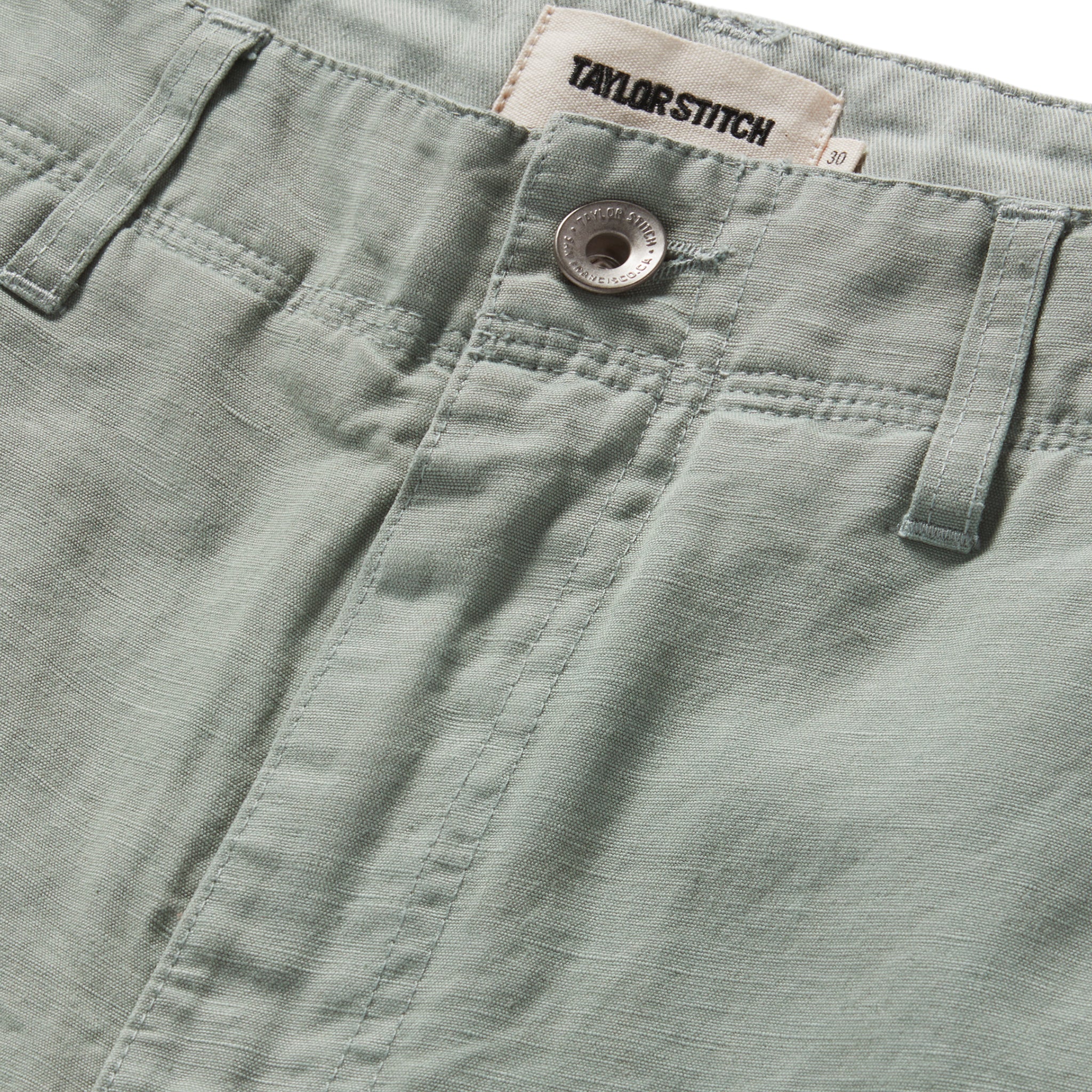 material shot of the button fly on The Morse Short in Slate Slub, Bottoms by Taylor Stitch