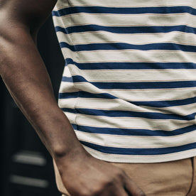 fit model showing the side of The Organic Cotton Tee in Daybreak Stripe