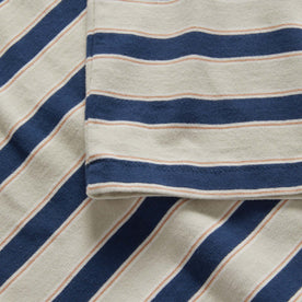 material shot of the sleeves on The Organic Cotton Tee in Daybreak Stripe