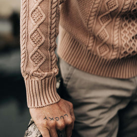 fit model showing the ribbed cuffs on The Orr Sweater in Dried Acorn