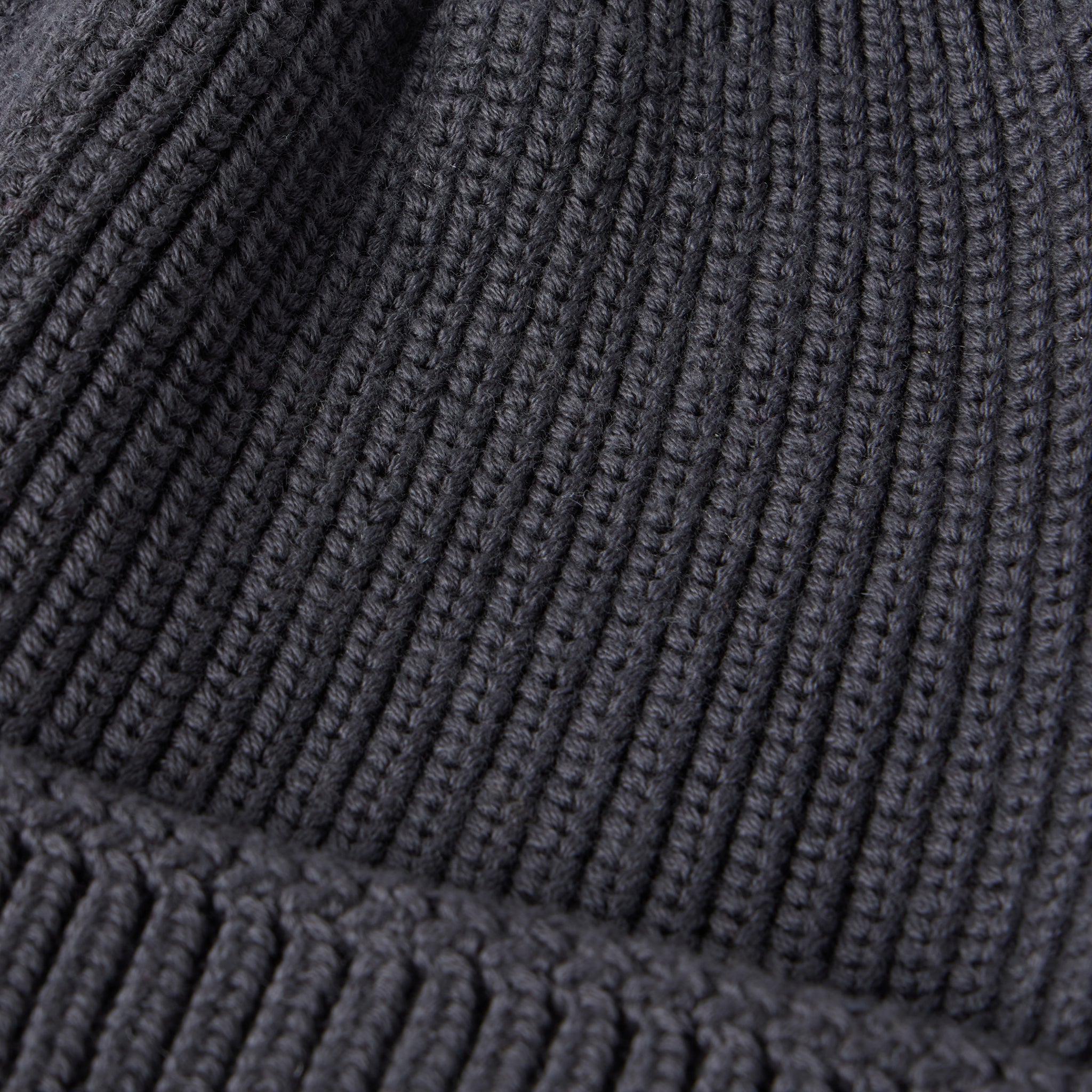 material shot of The Rib Beanie in Granite, Accessories by Taylor Stitch