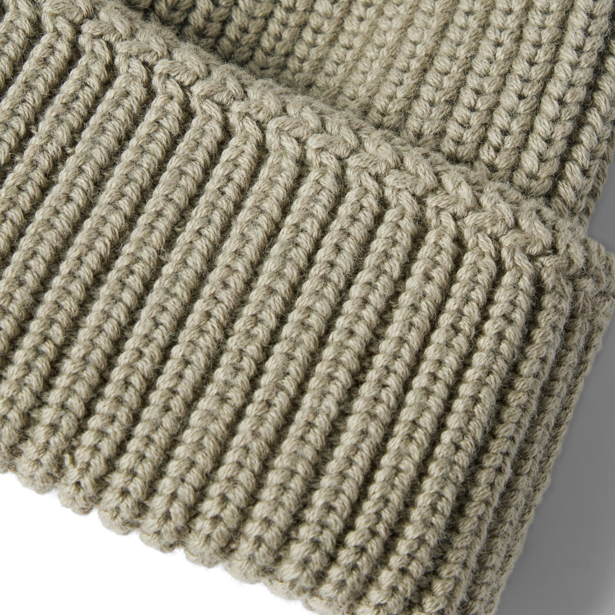 material shot of the ribbed bottom of The Rib Beanie in Sagebrush, Accessories by Taylor Stitch