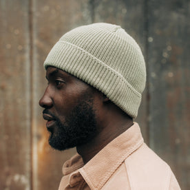 fit model showing the side of The Rib Beanie in Sagebrush