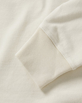 material shot of the sleeves on The Rugby Shirt in Mahogany and Natural Color Block, Knits by Taylor Stitch