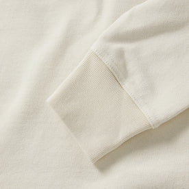 material shot of the sleeves on The Rugby Shirt in Mahogany and Natural Color Block