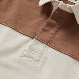 material shot of the buttons on The Rugby Shirt in Mahogany and Natural Color Block