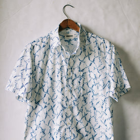 The Short Sleeve California in Deep Navy Crackle on a hanger