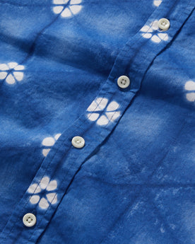 material shot of the buttons on The Short Sleeve Jack in Deep Navy Floral, Wovens by Taylor Stitch