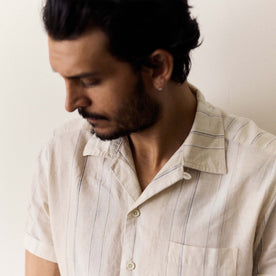 fit model showing the stripe pattern on The Short Sleeve Hawthorne in Fog Stripe, Wovens by Taylor Stitch