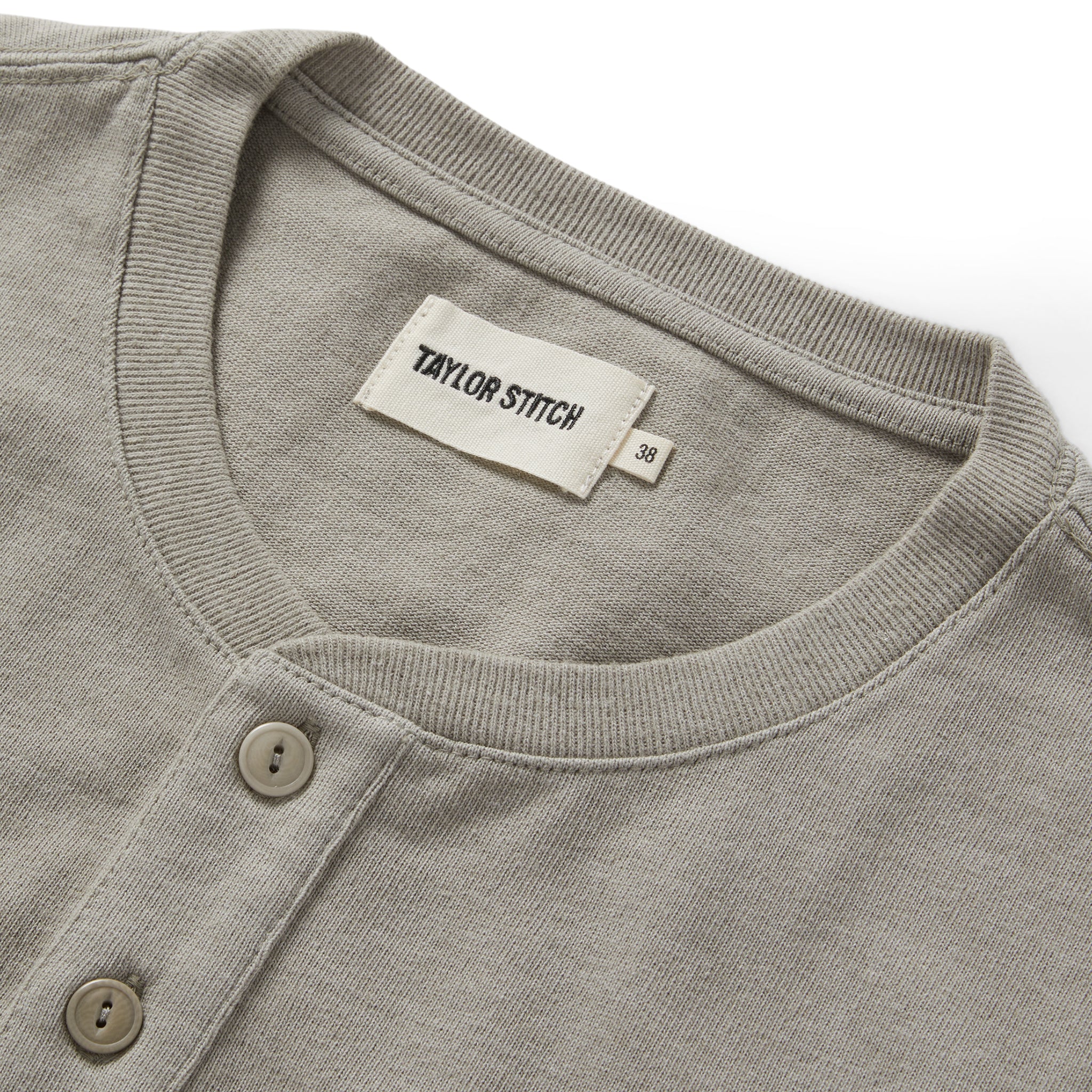 material shot of the collar on The Short Sleeve Heavy Bag Henley in Fog, Knits by Taylor Stitch