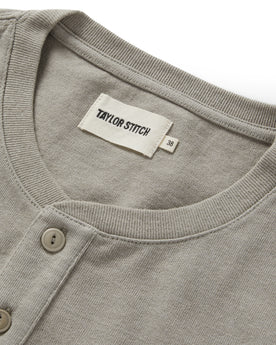 material shot of the collar on The Short Sleeve Heavy Bag Henley in Fog, Knits by Taylor Stitch