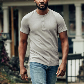 fit model walking in The Short Sleeve Heavy Bag Henley in Fog