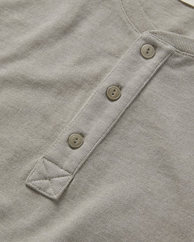 material shot of the buttons on The Short Sleeve Heavy Bag Henley in Fog, Knits by Taylor Stitch