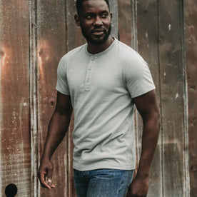 fit model walking in The Short Sleeve Heavy Bag Henley in Slate