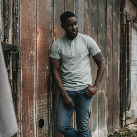 fit model posing in The Short Sleeve Heavy Bag Henley in Slate