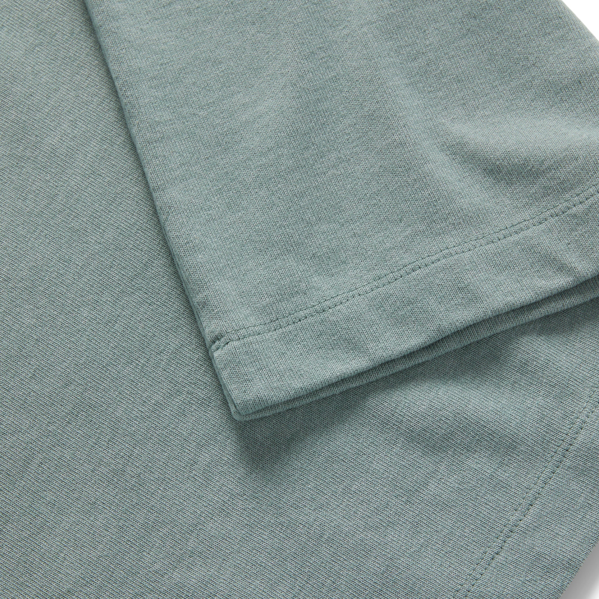 material shot of the sleeve on The Short Sleeve Heavy Bag Henley in Slate, Knits by Taylor Stitch
