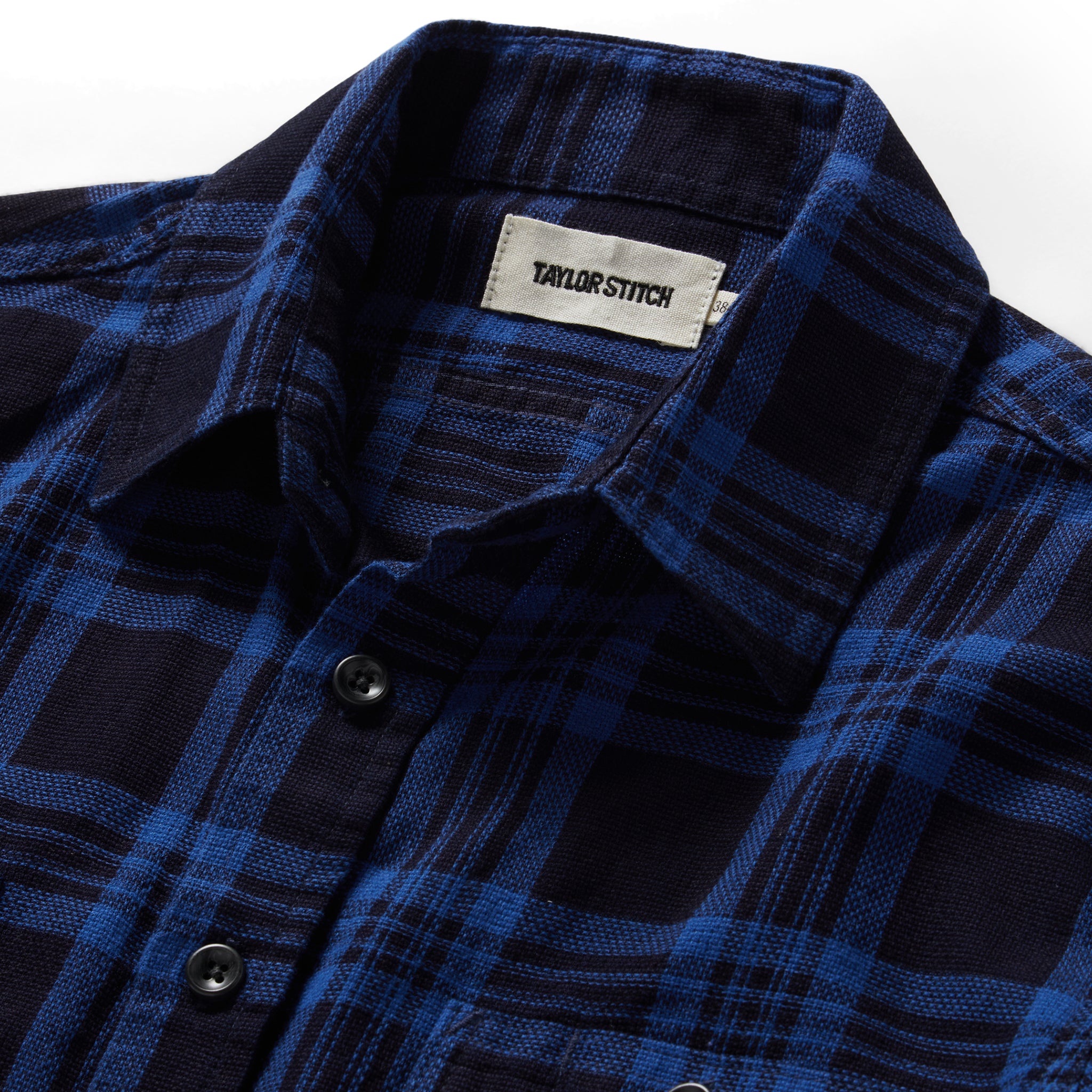 material shot of the collar on The Utility Shirt Rinsed Indigo Plaid, Wovens by Taylor Stitch