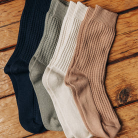 editorial image of various socks for The Waffle Sock in Natural